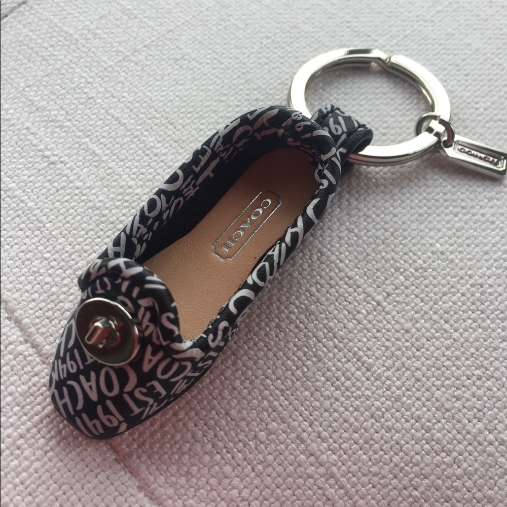 Coach black and white leather shoe keychain